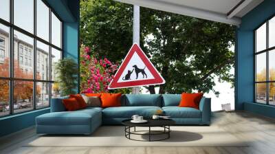 Cats and dogs, stray animals street crossing sign for caution Wall mural