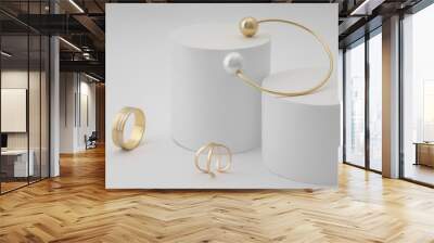 Golden with pearl bracelet and golden rings on white round platform on white background Wall mural