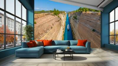 Greece Peloponnese Corinth Canal and a boat passing through the canal Wall mural