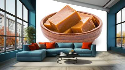 Brown cheese. Norwegian brunost served in a ceramic bowl, isolated against a white background with a full depth of field. Wall mural