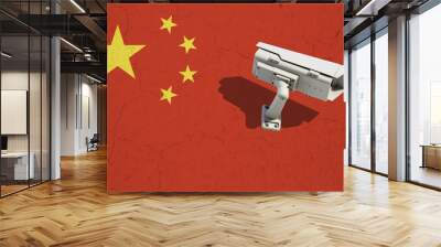 CCTV security camera on wall with painted China flag background. Concept political relations with neighbors Wall mural