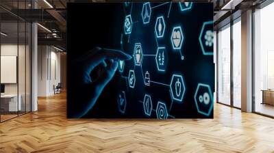 Hand interacting with medical icons on a digital screen, health tech concept with hexagonal background. Wall mural