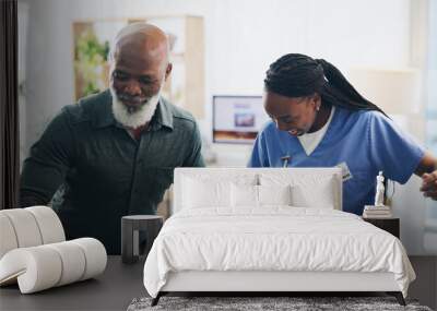 Nurse, senior man and recovery with walking in home for injury, care and holding hands with steps in retirement. Black people, balance and elderly person with disability, support and rehabilitation Wall mural