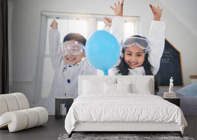 Portrait, children science and siblings winning in a home with a balloon for education, learning or experiment. Wow, motivation or celebration with happy boy and girl scientist in success or surprise Wall mural