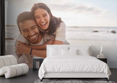 Couple, portrait and hug at the beach with happiness on vacation for love with sunshine. Man, woman and hugs at the ocean with sun for a holiday with a smile for the weekend with a relaxing date. Wall mural