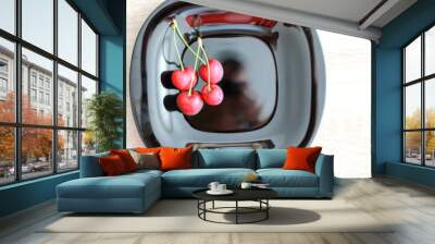 Fresh cherry on black plate on wooden white background. fresh ripe cherries. sweet cherries Wall mural