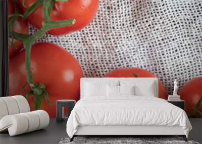 Some of juicy tomatoes on a white sackcloth Wall mural