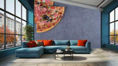 Two pepperoni pizza slice on grey background Wall mural