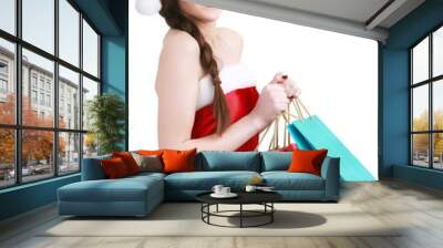 Happy girl shopping christmas gifts in shopping mall. Christmas shopping idea concept. Wall mural