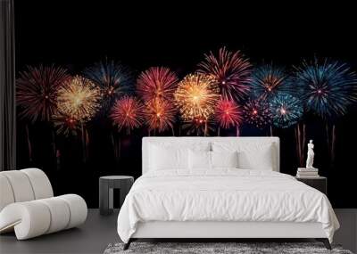 A series of colorful fireworks explode in the night sky, creating a dazzling display of light and color. Wall mural