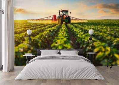 Tractor spraying pesticides fertilizer on soybean crops farm field in spring evening - ai Wall mural