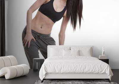 Young athlete streching Wall mural