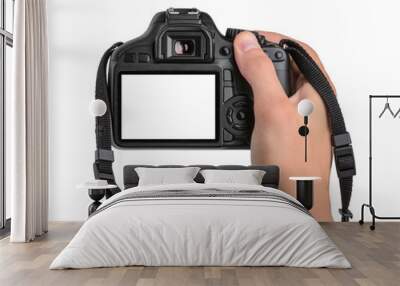 DSLR camera in hand isolated Wall mural