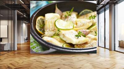 Baked fish fillet with lime and garlic Wall mural