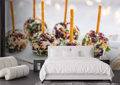 Christmas cheese ball appetizers with cranberries, pecans and herbs. Wall mural