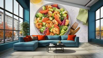 Delicious fresh salad with shrimp prawns, grapefruit, avocado, cucumber and green salad. Healthy food. Wall mural