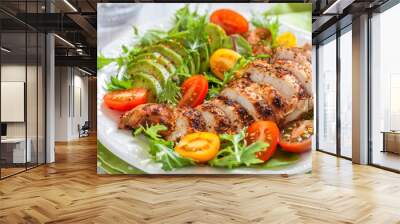 Healthy salad plate with colorful tomatoes, chicken breast and avocado Wall mural