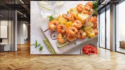 kebab skewers of barbecued shrimp with a pineapple Wall mural