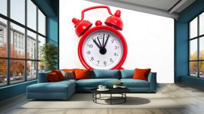 Red alarm clock on the white background Wall mural