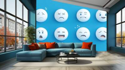 3D white emojis with different expressions on a light blue background. Wall mural