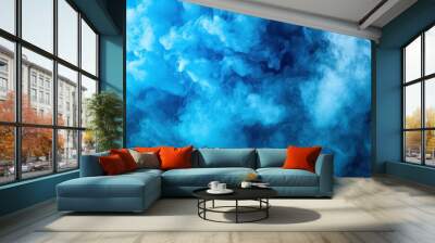 A swirling cloud of blue smoke creating an abstract, atmospheric effect. Wall mural