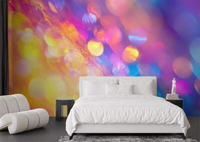 Abstract colorful bokeh background with bright yellow, pink, and blue lights. Wall mural