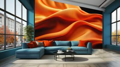 Abstract orange fabric texture with soft, wavy folds against a black background. Wall mural