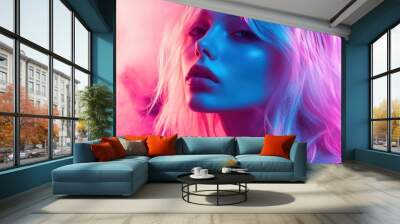 Close-up portrait of a young woman with blonde hair in blue and pink neon light. Wall mural