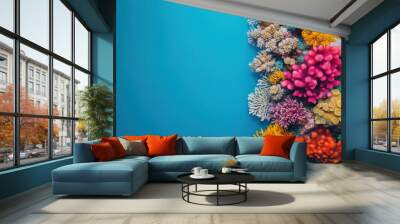 Colorful coral reef against a blue background. Wall mural