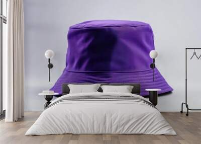 Purple bucket hat with a white background. Wall mural