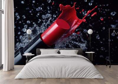 Red lipstick splashing into water with a black background. Wall mural