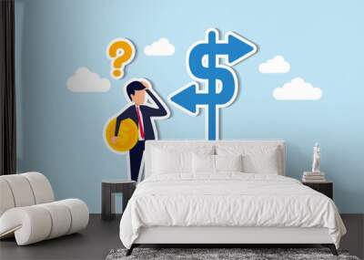 Money decision, investment choice or option to make profit, buy or rent, pay off debt or invest, select best earning asset, confused businessman investor hold money coin choose dollar direction signs. Wall mural