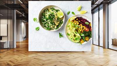 Colorful vegetable bowl with bulgur and chickpeas and kale-bulgur tabbouleh with garlic lime dressing. Top view. Copy space Wall mural