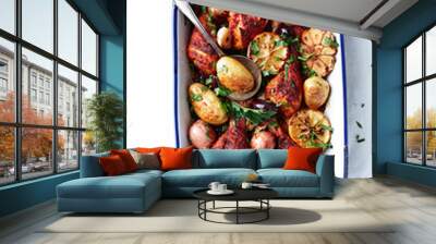 Oven-roasted spicy Chicken with Potatoes, Olives, Garlic, Onions and Lemon Wall mural