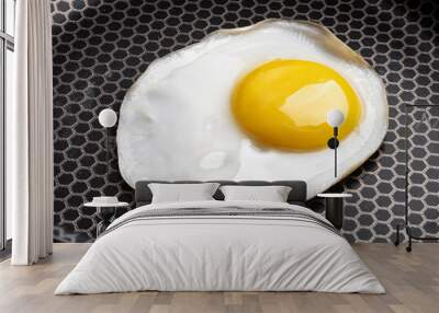 Closeup photo of fried egg on the pan surface Wall mural