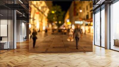 Crowd of anonymous people walking on busy city street at night , urban city life background Wall mural