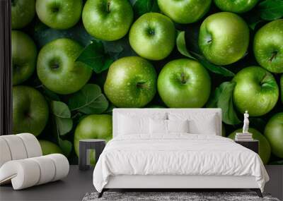 A bunch of green apples are on a table Wall mural