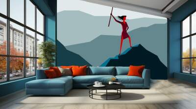 Woman with flag on a Mountain peak, Business success concept Wall mural