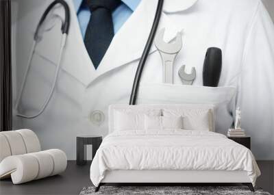 doctor with spanner and screw driver, various technical or medic Wall mural