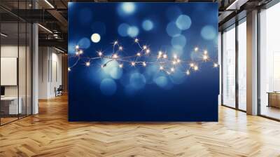 holiday illumination and decoration concept - christmas garland bokeh lights over dark blue background Wall mural