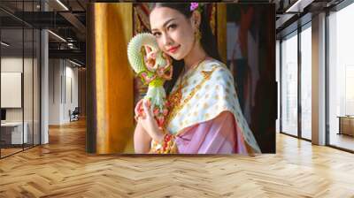 Thai girl in traditional thai costume, identity culture of Thailand. Wall mural