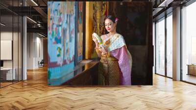 Thai girl in traditional thai costume, identity culture of Thailand. Wall mural