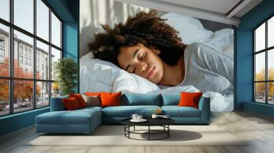 Close up of a pretty black woman with curly hair sleeping in bed, sweet dreams, eyes closed, copy space. Wall mural