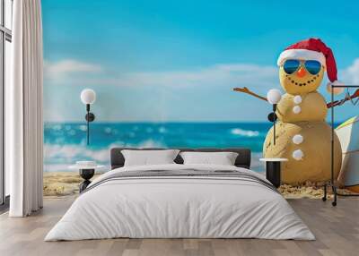 Smiling Santa sandy snowman in red santa hat and stylish sunglasses smiling on the sea beach with copy space, concept of winter holiday, Merry Christmas, happy summer time. Wall mural