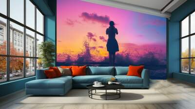 girl silhouette on sunset background Wall mural