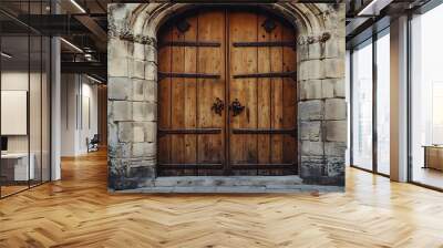 A large wooden door with ornate details set in a stone wall. Wall mural