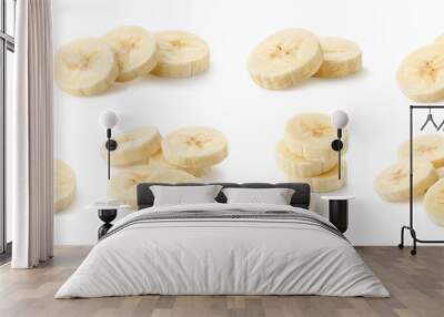 Collection of various fresh ripe banana slices on white background Wall mural