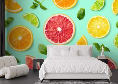 Colorful pattern of citrus fruit slices and mint leaves Wall mural