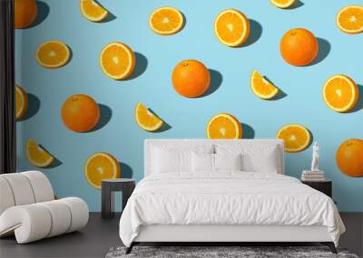 Colorful pattern of fresh ripe whole and sliced oranges Wall mural