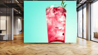 Glass of pomegranate spritzer cocktail with rosemary Wall mural